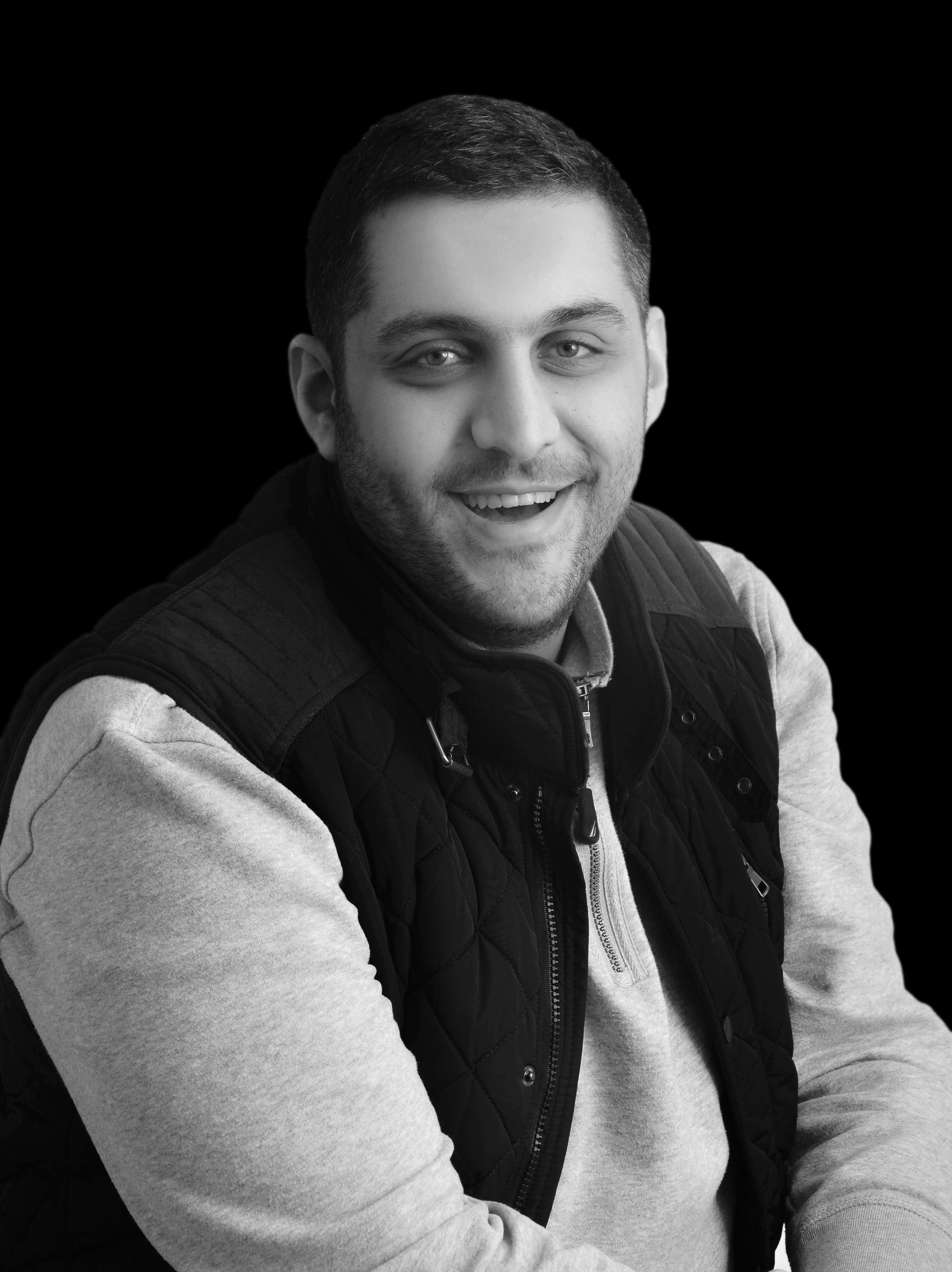 Majdy smiling like the best guy in the world